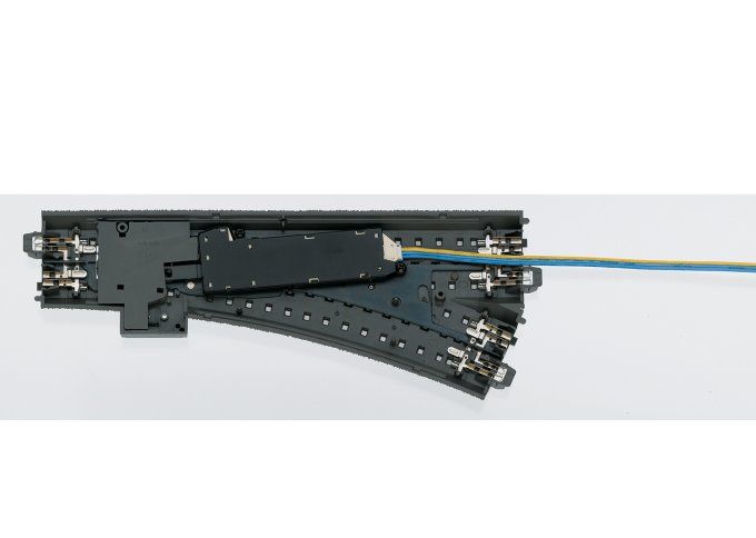 Entraînement électrique à commutateur C-track pour l’installation